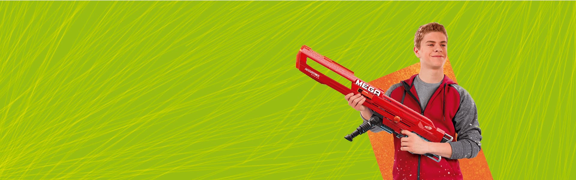 Kid holding mega Nerf blaster
